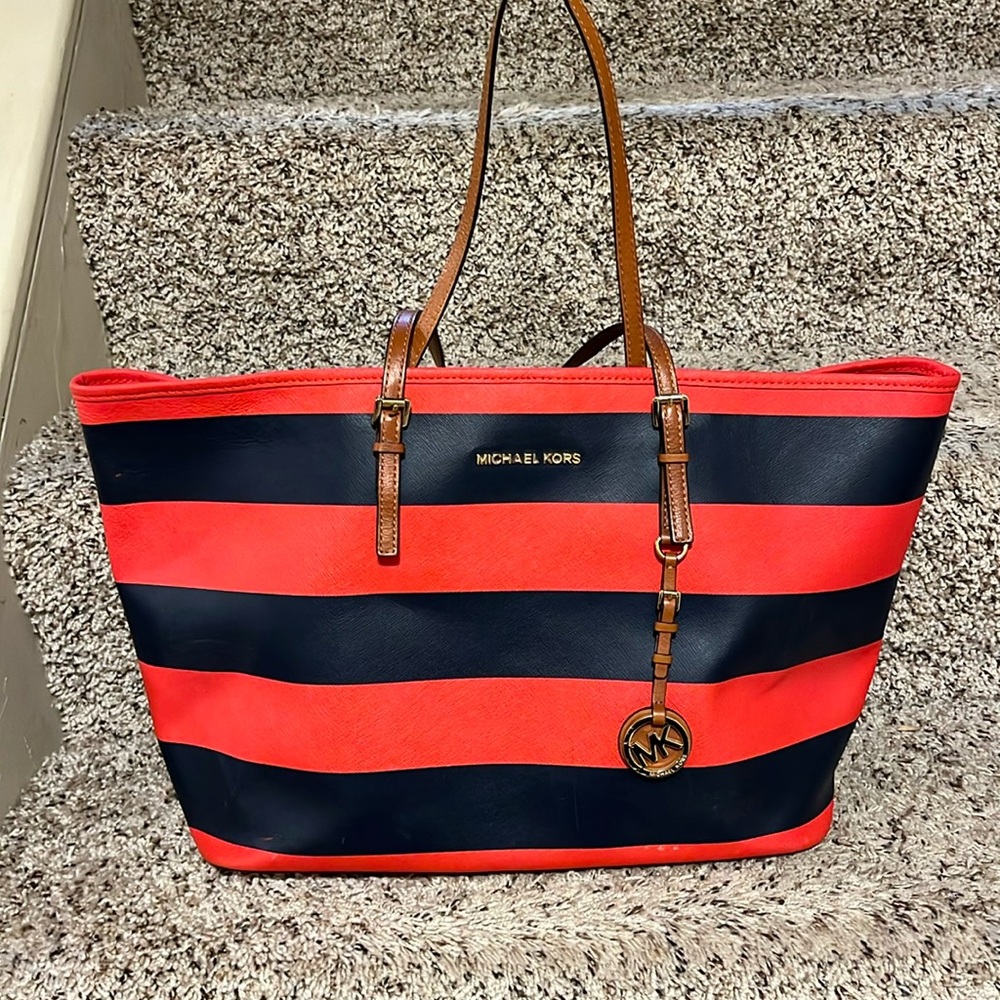 Michael Kors tote. EUC red and navy stripe. Tan leather trim